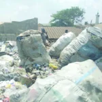 “We Are Living Inside Waste” — How Abuja’s Satellite Towns Are Slowly Turning Into Dumping Grounds